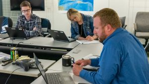 District staff siting around tables