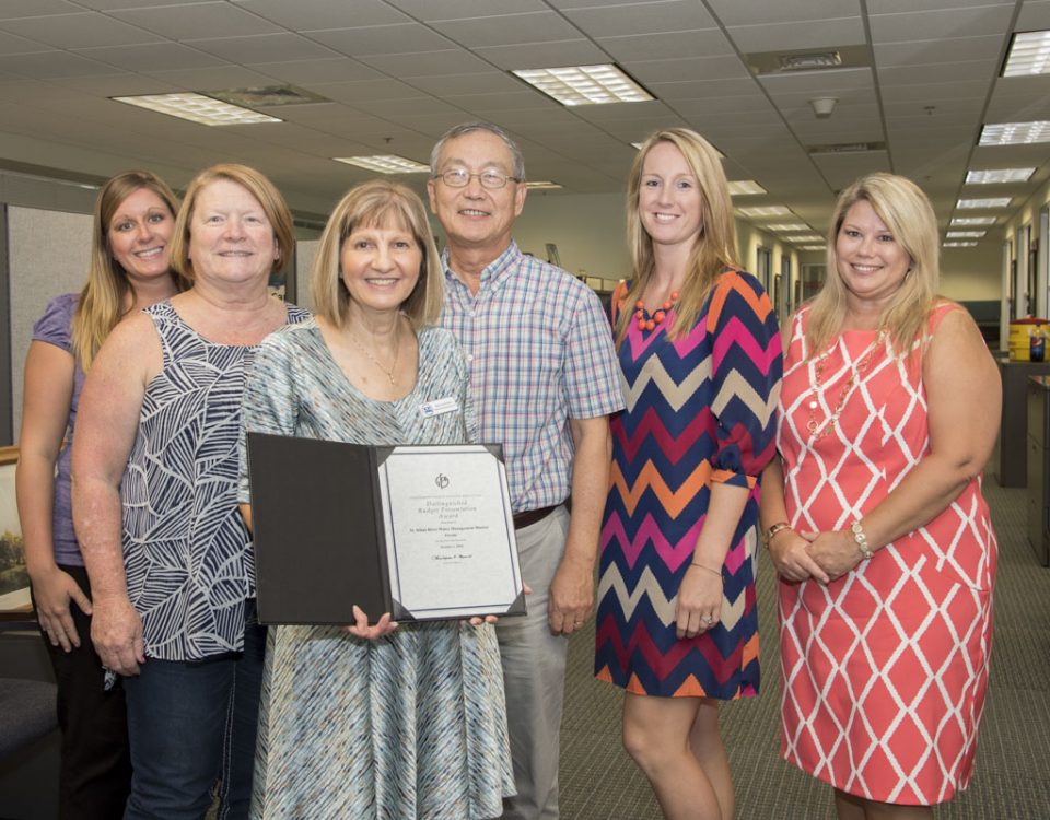 District budget staff with a Distinguished Budget Presentation Award