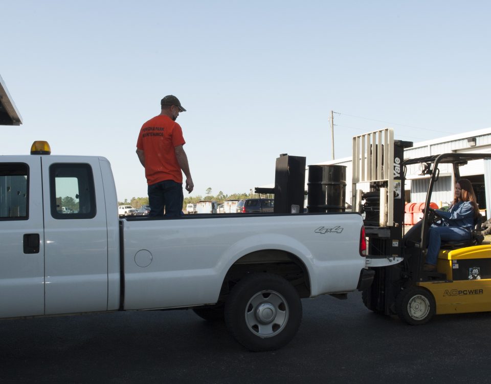 District staff donating surplus items at part of the REDI program