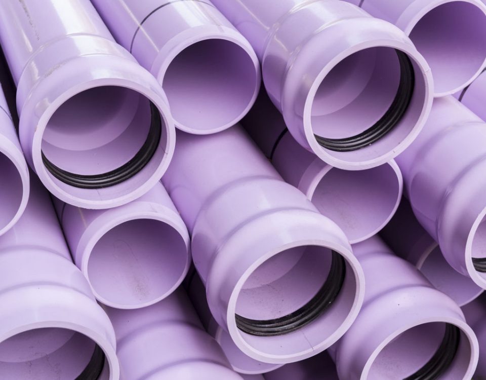 Stack of purple pipes used for reclaimed water lines