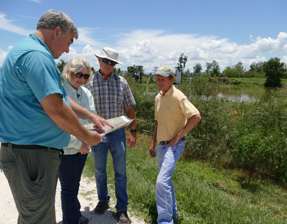 Dr. Erich Marzolf touring the Lake Apopka Marsh Flow-way with Dr. Ann Shortelle, Karl Hankin and Bob Nalway