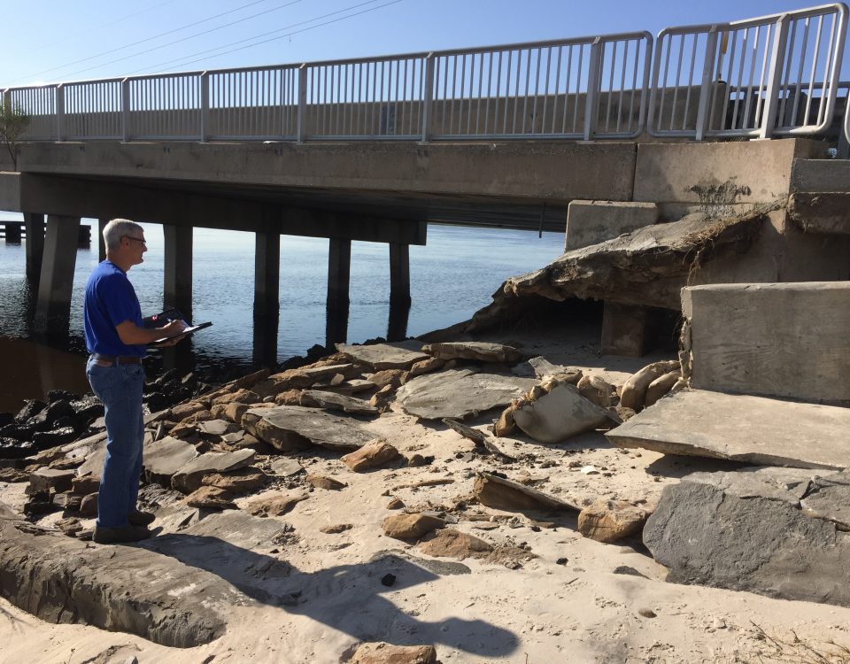 Robert Zammataro checking a bridge for damage after Hurricane Irma