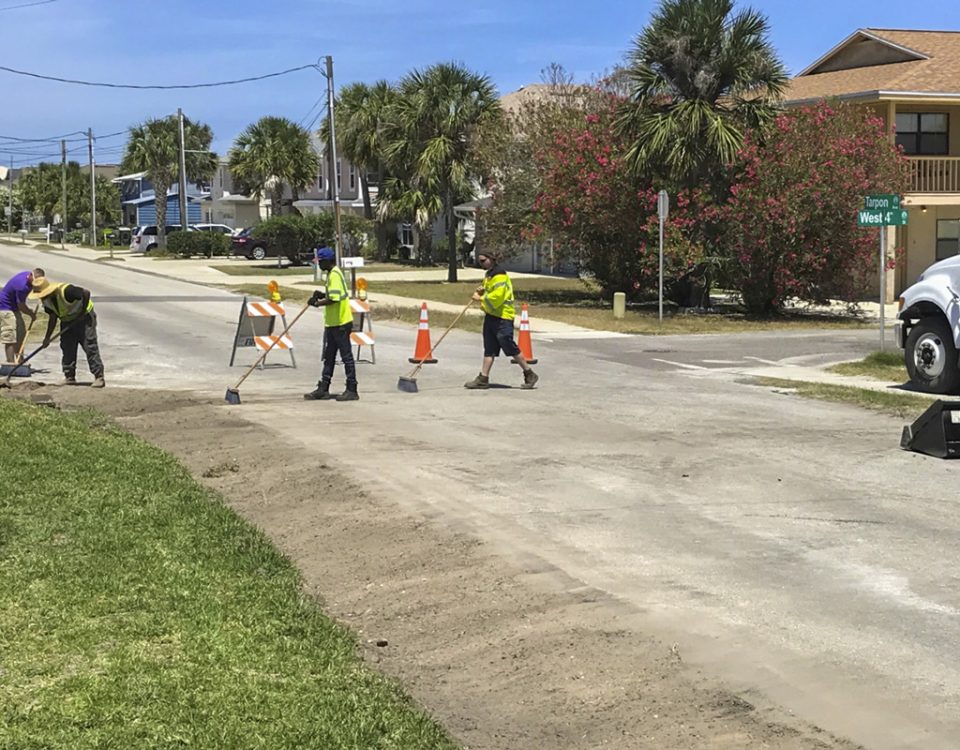 Crews working on Tarpon Avenue swales.