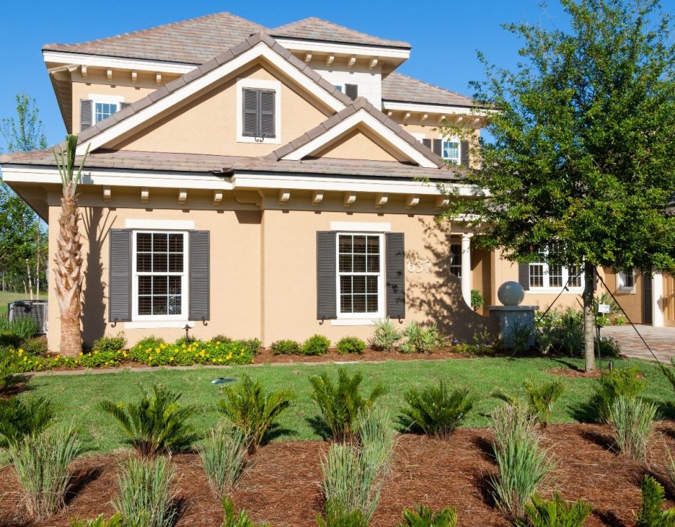 Gardens with drought-tolerant plants in front of a house