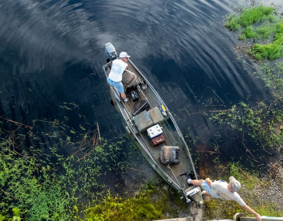 Fishermen launching their boat at Buck Lake