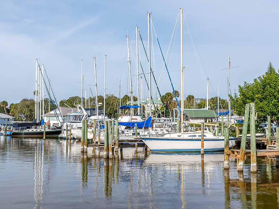 Sail boats docked in a harbour