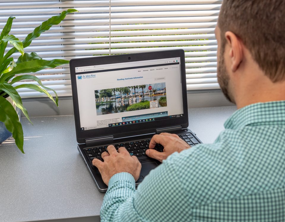 District staff on a laptop