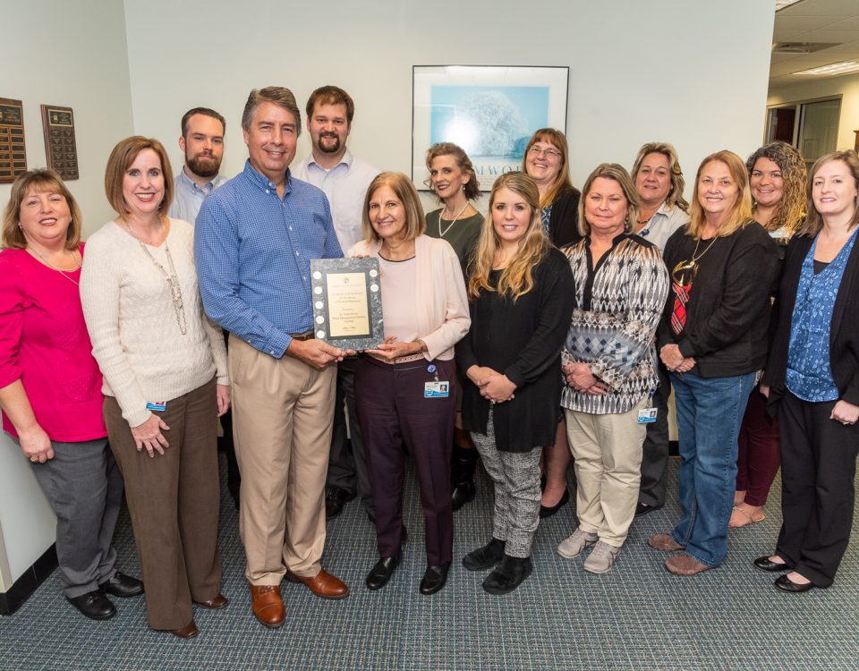 Office of Financial Services staff receiving an award