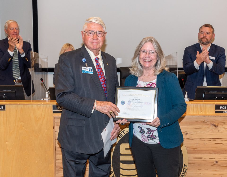 Dr. Ann Shortelle with Governing Board Chairman Gen. Douglas Burnett