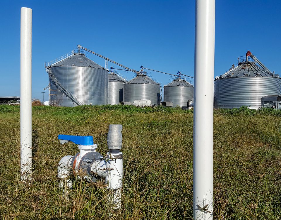 Pipes and shut off valve in a farm field