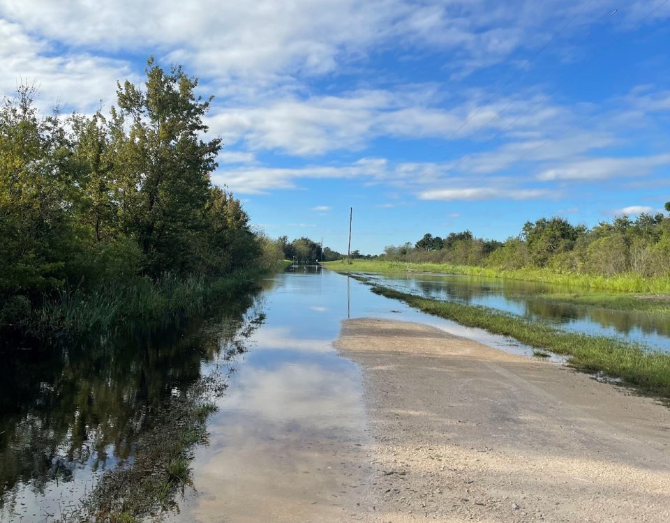 water over a gravel road