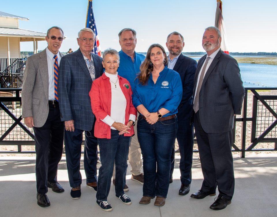 District leaders and their partners pictured together