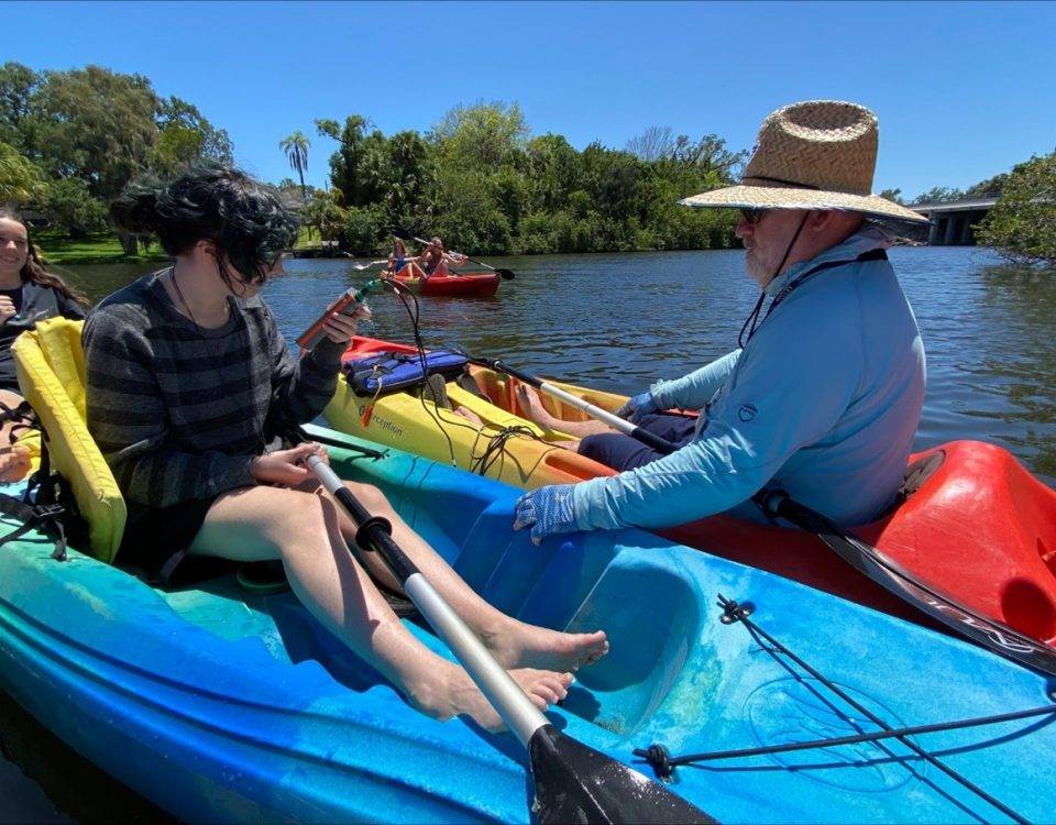 Students and instructors in canoes